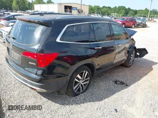2017 Honda Pilot Touring with VIN 5FNYF5H91HB038268, listed as a IAAI auction lot 42786448 with 62,195 mi miles and . Bid and sale history available at DreamBid. Image 4.