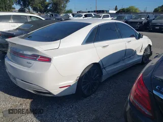 2016 Lincoln MKZ Hybrid z VIN 3LN6L2LU5GR613636, wystawiony jako IAAI lot #42613605 z przebiegiem Nie podano mil oraz . Historia ofert i sprzedaży dostępna na DreamBid. Obrazek 4.