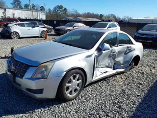 2009 Cadillac CTS AWD w/1SB with VIN 1G6DS57V090127289, listed as a IAAI auction lot 41675952 with 147,464 mi miles. Bid and sale history available at carsss.com. Image 2.