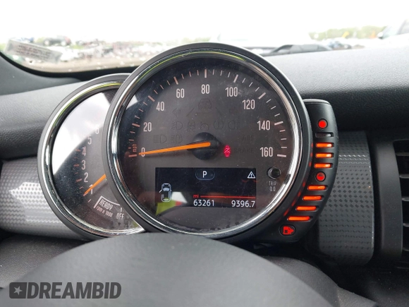 2015 MINI Hardtop 4 Door with VIN WMWXS5C52FT831291, listed as a IAAI auction lot 42179801 with 63,261 mi miles and . Bid and sale history available at DreamBid. Image 7.