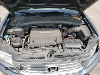 2012 Honda Ridgeline RTL z VIN 5FPYK1F59CB001005, wystawiony jako Copart lot #59713305 z przebiegiem 204 963 mil mil oraz Szkoda całkowita • Salvage title. Historia ofert i sprzedaży dostępna na DreamBid. Obrazek 11.