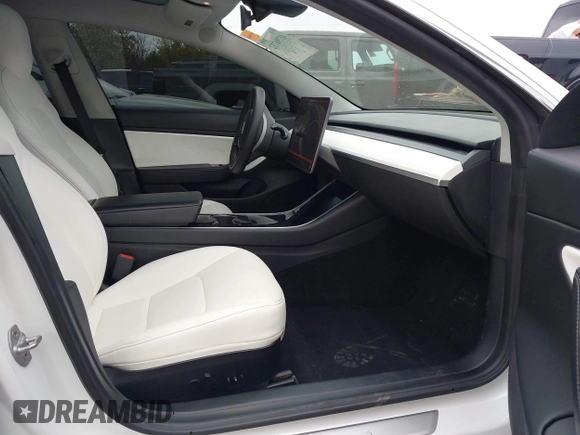 2020 Tesla Model 3 Long Range with VIN 5YJ3E1EB0LF703733, listed as a IAAI auction lot 41796732 with 75,027 mi miles. Bid and sale history available at carsss.com. Image 5.