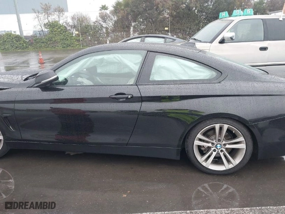 2015 BMW 4 Series 428i with VIN WBA3N7C57FK222351, listed as a IAAI auction lot 41490737 with 99,322 mi miles. Bid and sale history available at carsss.com. Image 14.