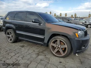 2007 Jeep Grand Cherokee SRT-8 with VIN 1J8HR78357C502665, listed as a Copart auction lot 84772624 with 153,311 mi miles and Clean Title. Bid and sale history available at carsss.com. Image 4.