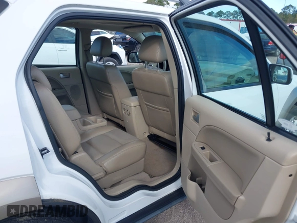 2005 Ford Freestyle SEL z VIN 1FMZK05135GA20093, wystawiony jako IAAI lot #40887207 z przebiegiem 105 144 mil mil oraz . Historia ofert i sprzedaży dostępna na DreamBid. Obrazek 8.