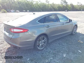 2014 Ford Fusion Titanium with VIN 3FA6P0K98ER197482, listed as a IAAI auction lot 42251293 with 165,520 mi miles and . Bid and sale history available at DreamBid. Image 4.