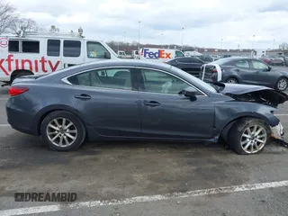 2014 Mazda 6 i Sport with VIN JM1GJ1U51E1111018, listed as a IAAI auction lot 41875461 with 253,755 mi miles and . Bid and sale history available at DreamBid. Image 13.