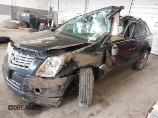 2014 Cadillac SRX Premium Collection with VIN 3GYFNGE35ES636852, listed as a IAAI auction lot 42283604 with 167,983 mi miles and . Bid and sale history available at DreamBid. Image 18.