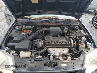 2000 Honda Civic LX z VIN 1HGEJ6670YL054677, wystawiony jako Copart lot #57126335 z przebiegiem 155 471 mil mil oraz Szkoda całkowita • Salvage title. Historia ofert i sprzedaży dostępna na DreamBid. Obrazek 11.