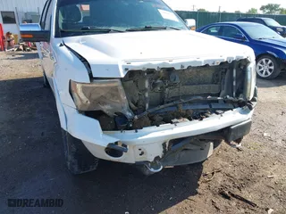 2013 Ford F-150 XLT with VIN 1FTFW1E63DFD68137, listed as a IAAI auction lot 39486139 with 169,017 mi miles. Bid and sale history available at carsss.com. Image 6.