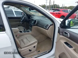 2014 Jeep Grand Cherokee Overland with VIN 1C4RJECG4EC543092, listed as a IAAI auction lot 40981315 with 149,096 mi miles. Bid and sale history available at carsss.com. Image 5.