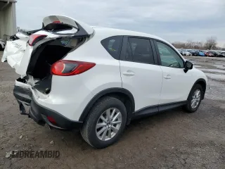 2016 Mazda CX-5 Touring with VIN JM3KE4CY7G0821701, listed as a Copart auction lot 43805495 with 144,416 mi miles and Salvage Title. Bid and sale history available at carsss.com. Image 3.