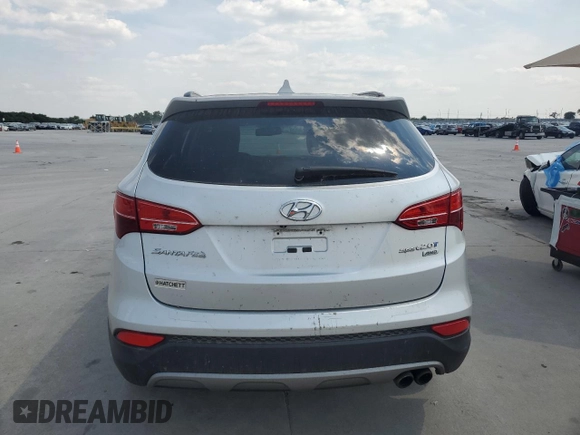 2013 Hyundai Santa Fe Sport z VIN 5XYZUDLA2DG069389, wystawiony jako Copart lot #64054684 z przebiegiem 162 861 mil mil oraz Szkoda całkowita • Salvage title. Historia ofert i sprzedaży dostępna na DreamBid. Obrazek 6.