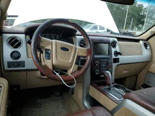 2014 Ford F-150 XL with VIN 1FTFW1EFXEKF15692, listed as a Copart auction lot 61142145 with 215,008 mi miles and Salvage title. Bid and sale history available at DreamBid. Image 8.