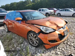 2012 Hyundai Veloster w/Red Int with VIN KMHTC6AD9CU044547, listed as a Copart auction lot 72633624 with 69,261 mi miles and Salvage title. Bid and sale history available at DreamBid. Image 4.