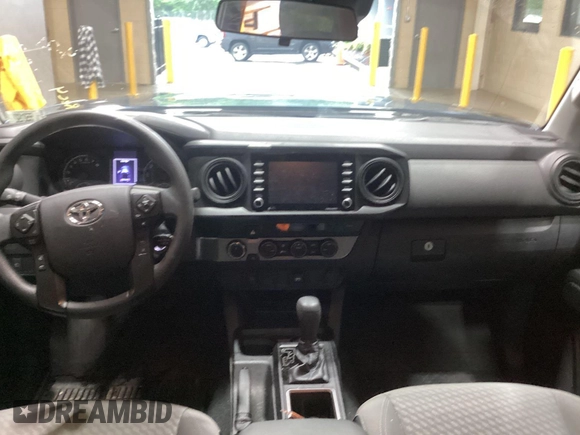 2021 Toyota Tacoma 4WD SR with VIN 3TMCZ5ANXMM444368, listed as a IAAI auction lot 42153157 with 23,274 mi miles. Bid and sale history available at carsss.com. Image 1.
