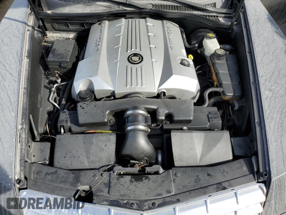 2006 Cadillac XLR z VIN 1G6YV36A965600309, wystawiony jako Copart lot #73937584 z przebiegiem Nie podano mil oraz Szkoda całkowita • Salvage title. Historia ofert i sprzedaży dostępna na DreamBid. Obrazek 11.