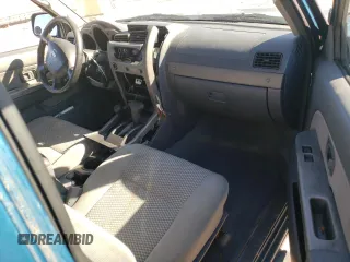 2003 Nissan Frontier XE with VIN 1N6ED26Y93C468148, listed as a Copart auction lot 76468404 with 178,257 mi miles and Salvage title. Bid and sale history available at DreamBid. Image 8.