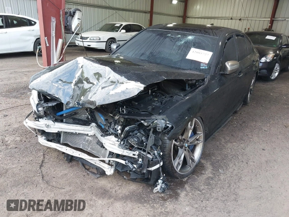 2018 BMW 5 Series M550i xDrive with VIN WBAJB9C51JB035949, listed as a IAAI auction lot 42085727 with Not provided miles and . Bid and sale history available at DreamBid. Image 16.