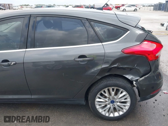 2017 Ford Focus Titanium with VIN 1FADP3N20HL210364, listed as a IAAI auction lot 42130643 with 132,312 mi miles and . Bid and sale history available at DreamBid. Image 19.
