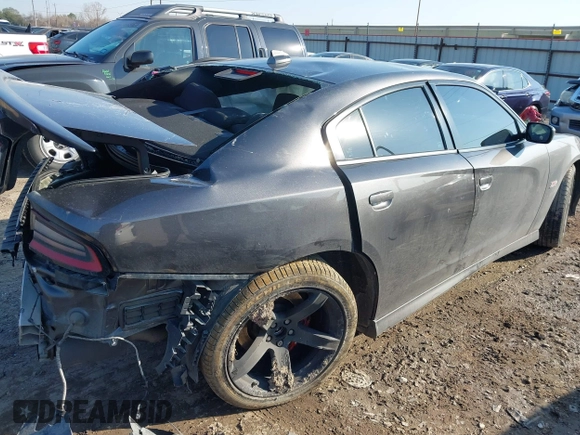 2021 Dodge Charger Scat Pack with VIN 2C3CDXGJ9MH511348, listed as a IAAI auction lot 41688349 with 56,425 mi miles and . Bid and sale history available at DreamBid. Image 4.