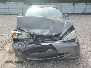 2004 Toyota Camry LE z VIN 4T1BE32K74U848946, wystawiony jako Copart lot #56030995 z przebiegiem Nie podano mil oraz Szkoda całkowita • Salvage title. Historia ofert i sprzedaży dostępna na DreamBid. Obrazek 5.