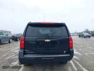 2016 Chevrolet Tahoe LTZ with VIN 1GNSKCKC2GR104305, listed as a IAAI auction lot 41697868 with 124,670 mi miles. Bid and sale history available at carsss.com. Image 16.