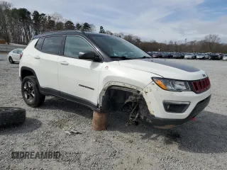 2018 Jeep Compass Trailhawk with VIN 3C4NJDDB9JT451440, listed as a Copart auction lot 47638765 with 115,683 mi miles and Salvage Title. Bid and sale history available at carsss.com. Image 4.