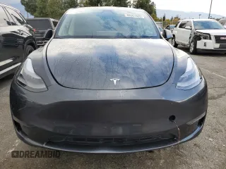 2024 Tesla Model Y with VIN 7SAYGDED1RF052031, listed as a Copart auction lot 48507865 with 5,365 mi miles and Salvage title. Bid and sale history available at DreamBid. Image 12.