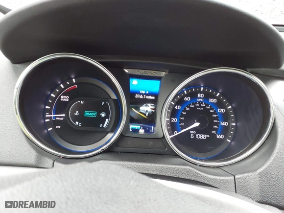 2013 Hyundai Sonata Hybrid with VIN KMHEC4A44DA077276, listed as a IAAI auction lot 41752360 with 62,700 mi miles. Bid and sale history available at carsss.com. Image 7.