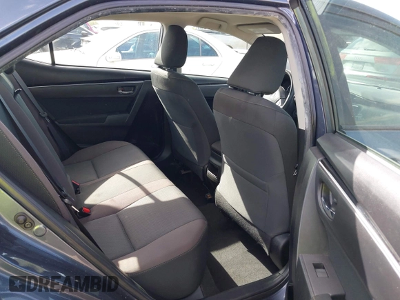 2018 Toyota Corolla L with VIN 5YFBURHEXJP806632, listed as a IAAI auction lot 41933984 with 70,091 mi miles and . Bid and sale history available at DreamBid. Image 8.