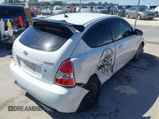 2007 Hyundai Accent GS with VIN KMHCM36C47U050161, listed as a IAAI auction lot 41762927 with 111,684 mi miles. Bid and sale history available at carsss.com. Image 4.