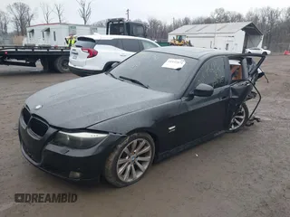 2011 BMW 3 Series 328i xDrive with VIN WBAPK5G52BNN29900, listed as a IAAI auction lot 41441074 with 148,646 mi miles. Bid and sale history available at carsss.com. Image 2.