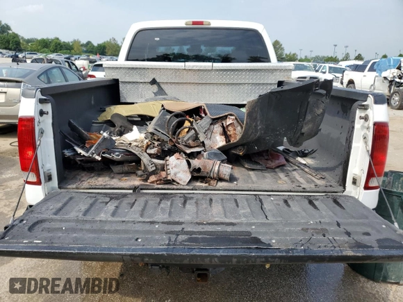 2004 Ford Super Duty F-250 XL with VIN 1FTNW21P14EA23582, listed as a Copart auction lot 62658954 with 205,382 mi miles and Salvage Title. Bid and sale history available at carsss.com. Image 6.