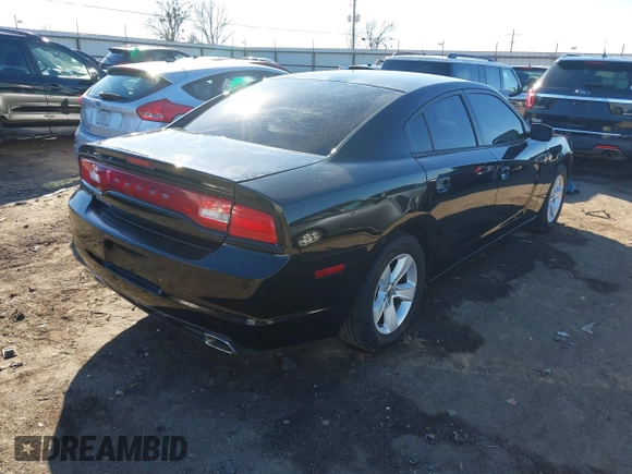 2014 Dodge Charger SE with VIN 2C3CDXBG9EH116776, listed as a IAAI auction lot 41465565 with 128,319 mi miles. Bid and sale history available at carsss.com. Image 4.