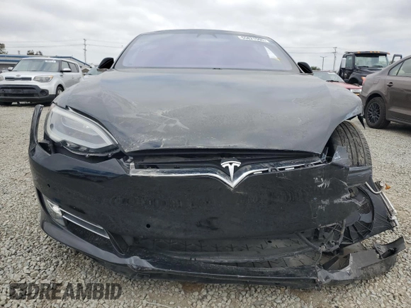 2019 Tesla Model S 75D with VIN 5YJSA1E25KF299740, listed as a Copart auction lot 55821595 with 140,385 mi miles and Salvage title. Bid and sale history available at DreamBid. Image 5.