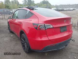 2023 Tesla Model Y Long Range with VIN 7SAYGAEE5PF685474, listed as a IAAI auction lot 40348773 with 26,605 mi miles and . Bid and sale history available at DreamBid. Image 3.