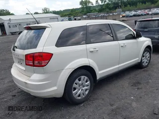 2013 Dodge Journey SE with VIN 3C4PDCAB7DT695493, listed as a IAAI auction lot 42450756 with 153,064 mi miles and . Bid and sale history available at DreamBid. Image 4.