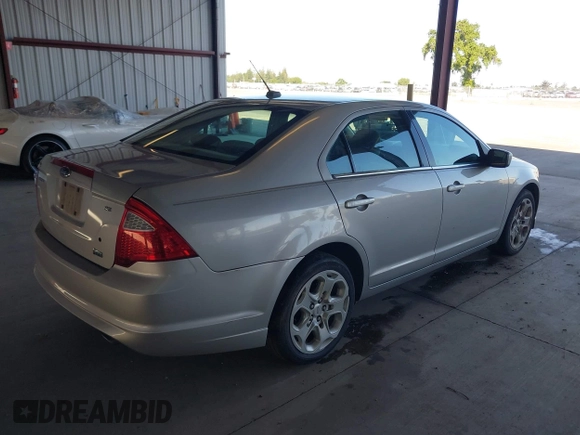 2010 Ford Fusion SE with VIN 3FAHP0HG7AR155281, listed as a IAAI auction lot 41969735 with 132,156 mi miles and . Bid and sale history available at carsss.com. Image 4.