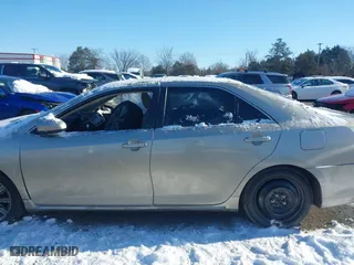 2014 Toyota Camry SE with VIN 4T1BK1FK6EU026342, listed as a IAAI auction lot 41246628 with 142,586 mi miles. Bid and sale history available at carsss.com. Image 14.