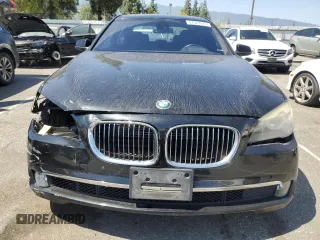 2011 BMW 7 Series with VIN WBAKX8C55BC198292, listed as a Copart auction lot 57907915 with 76,478 mi miles and Salvage title. Bid and sale history available at DreamBid. Image 5.