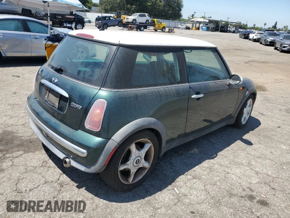 2002 MINI Hardtop with VIN WMWRC33442TC35176, listed as a Copart auction lot 65486135 with 58,504 mi miles and Clean title. Bid and sale history available at DreamBid. Image 3.