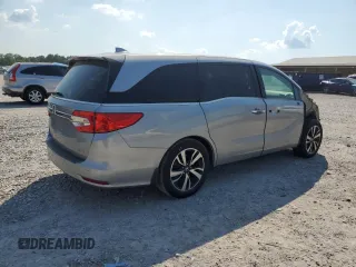 2018 Honda Odyssey Elite with VIN 5FNRL6H94JB010442, listed as a Copart auction lot 62077815 with 118,058 mi miles and Salvage title. Bid and sale history available at DreamBid. Image 3.