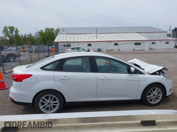 2016 Ford Focus SE with VIN 1FADP3F21GL403121, listed as a IAAI auction lot 42130743 with 103,592 mi miles and . Bid and sale history available at DreamBid. Image 13.