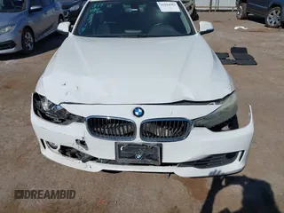 2013 BMW 3 Series 328i with VIN WBA3A5G52DNP18714, listed as a IAAI auction lot 41844082 with 104,867 mi miles and . Bid and sale history available at DreamBid. Image 12.