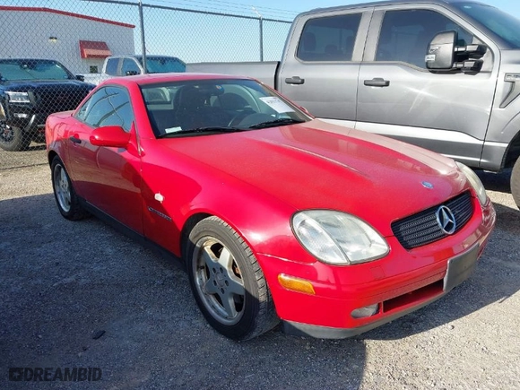 1998 Mercedes-Benz SLK-Class with VIN WDBKK47F7WF058115, listed as a IAAI auction lot 42011747 with 118,423 mi miles. Bid and sale history available at carsss.com. Image 1.