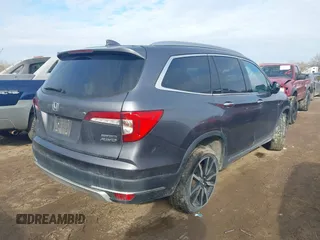 2019 Honda Pilot Touring 7-Passenger with VIN 5FNYF6H67KB018769, listed as a IAAI auction lot 41310452 with 92,499 mi miles. Bid and sale history available at carsss.com. Image 4.