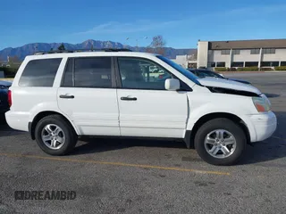 2005 Honda Pilot EX with VIN 5FNYF18475B060655, listed as a IAAI auction lot 41381619 with 142,680 mi miles and . Bid and sale history available at DreamBid. Image 13.