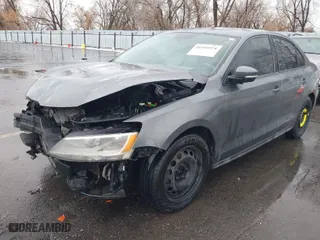 2014 Volkswagen Jetta Sedan SE with VIN 3VWD17AJ3EM422571, listed as a IAAI auction lot 41195974 with 218,595 mi miles. Bid and sale history available at carsss.com. Image 2.
