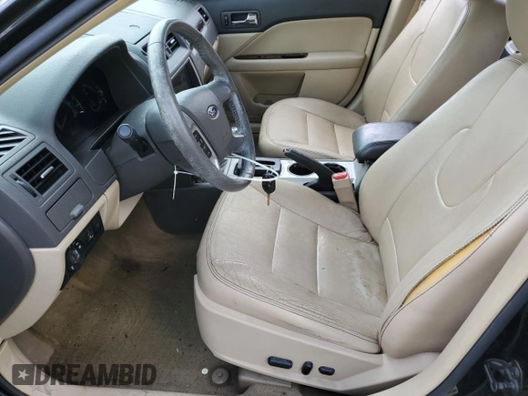 2012 Ford Fusion SEL z VIN 3FAHP0JG4CR388483, wystawiony jako Copart lot #57391805 z przebiegiem 184 665 mil mil oraz Szkoda całkowita • Salvage title. Historia ofert i sprzedaży dostępna na DreamBid. Obrazek 7.